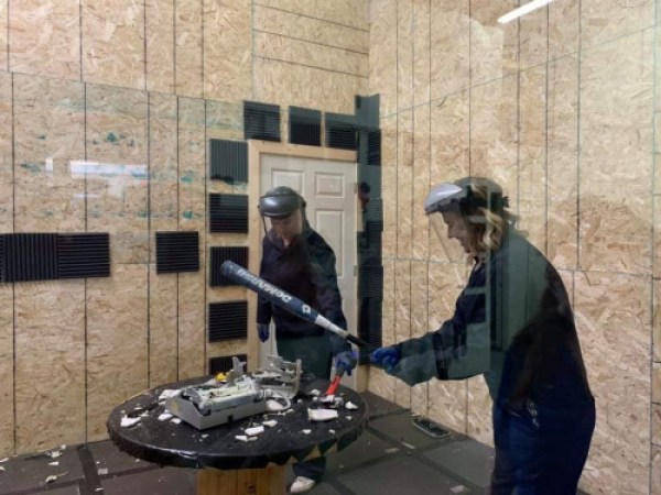 9-w500-o a man standing in front of a building